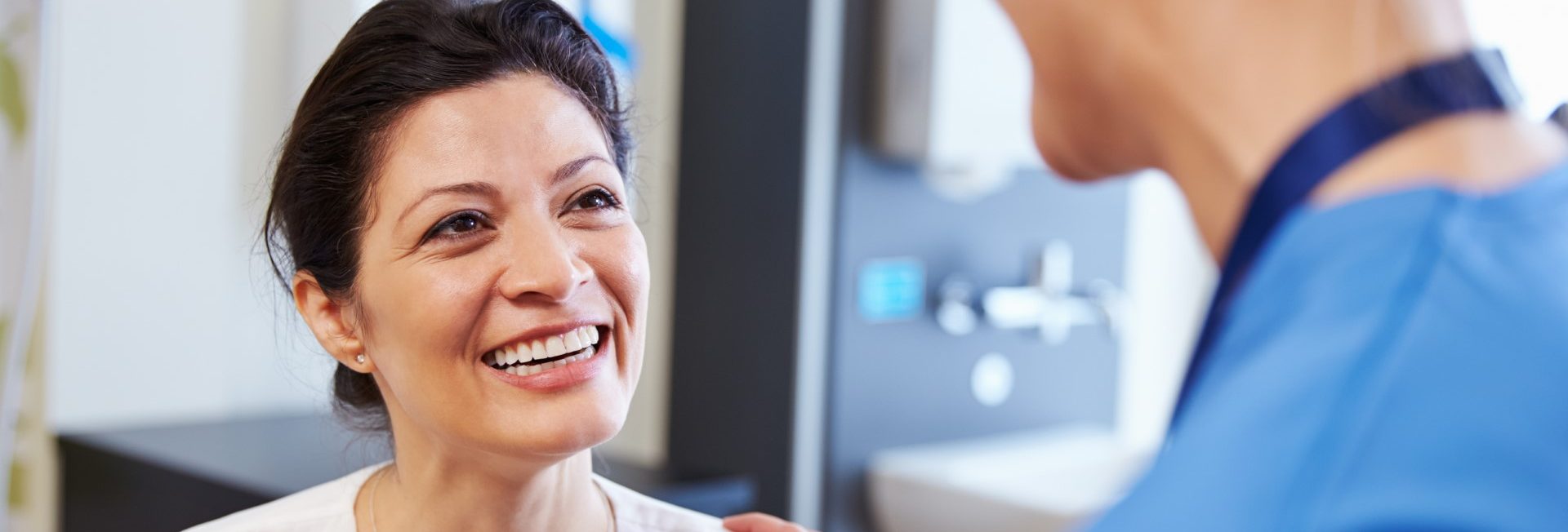 Female,Patient,Being,Reassured,By,Doctor,In,Hospital,Room